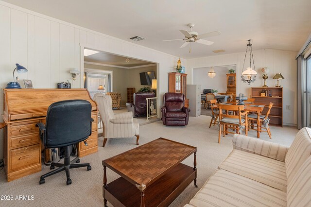 10228 W Concord Ave, Sun City, AZ 85351 - living area with light carpet, a ceiling fan, healthy amount of natural light, a desk, and lofted ceiling