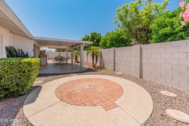 10228 W Concord Ave, Sun City, AZ 85351 - view of patio / terrace with a fenced backyard