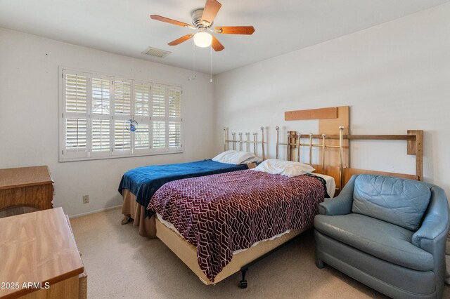 10228 W Concord Ave, Sun City, AZ 85351 - bedroom featuring carpet and ceiling fan