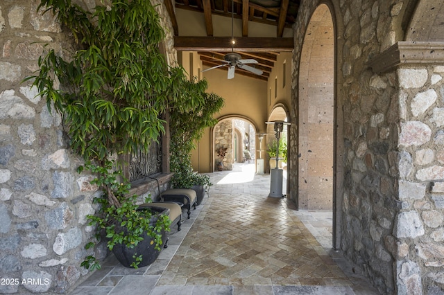 view of patio featuring ceiling fan