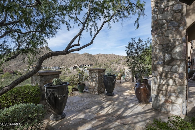 view of patio with a mountain view