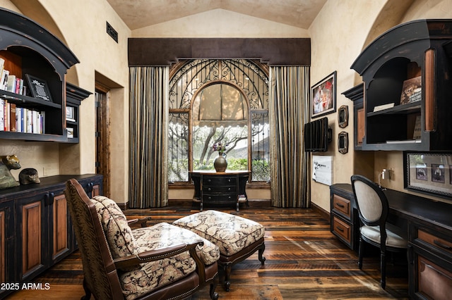 home office featuring dark hardwood / wood-style flooring and vaulted ceiling