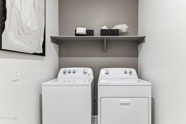 clothes washing area featuring separate washer and dryer