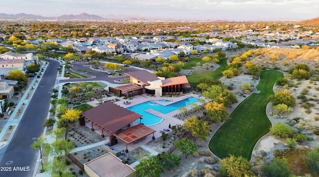 birds eye view of property featuring a mountain view