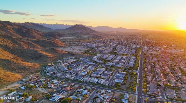 aerial view at dusk with a mountain view