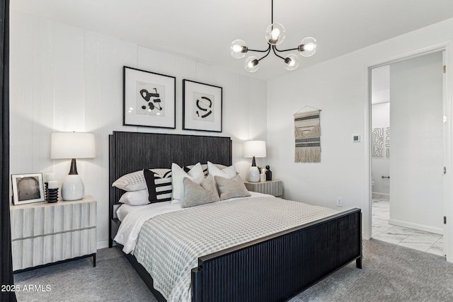 bedroom featuring carpet flooring and a chandelier