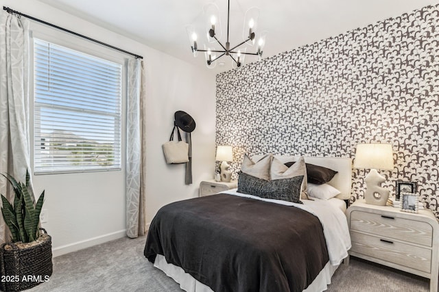 carpeted bedroom with a chandelier