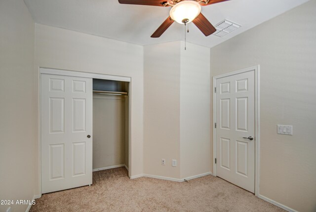 walk in closet featuring carpet flooring