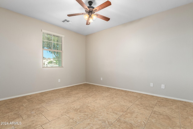 unfurnished room featuring ceiling fan