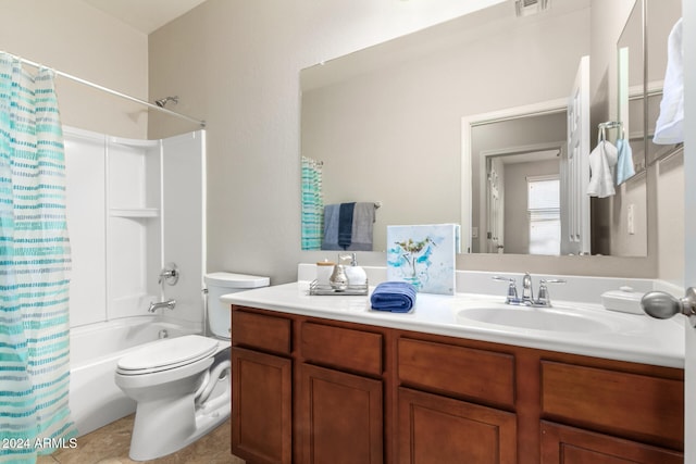 full bathroom with tile patterned floors, vanity, shower / tub combo, and toilet