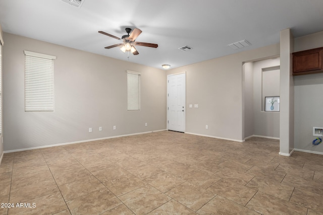 unfurnished room featuring ceiling fan