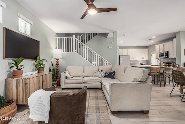 3037 E Hobart St, Gilbert, AZ 85296 - living area featuring ceiling fan, stairs, healthy amount of natural light, and recessed lighting