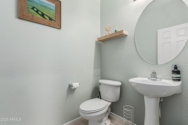 3037 E Hobart St, Gilbert, AZ 85296 - half bathroom with toilet and wood finished floors