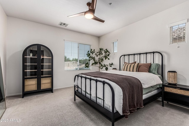 3037 E Hobart St, Gilbert, AZ 85296 - bedroom with light colored carpet and a ceiling fan