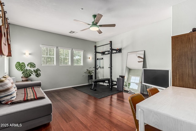 3037 E Hobart St, Gilbert, AZ 85296 - bedroom with dark wood-style floors, multiple windows, and ceiling fan