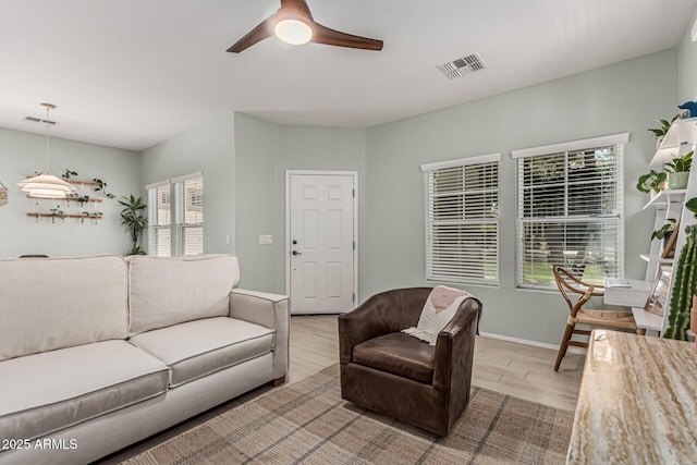 3037 E Hobart St, Gilbert, AZ 85296 - living area with a ceiling fan and light wood-type flooring