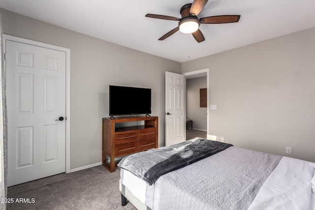 carpeted bedroom featuring ceiling fan