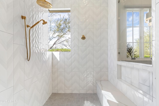 full bath with a tile shower