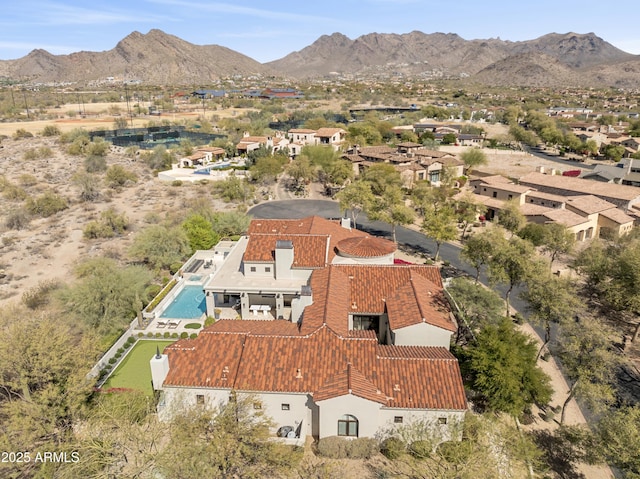 drone / aerial view featuring a mountain view