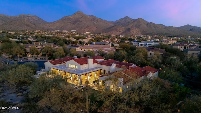 birds eye view of property with a residential view and a mountain view