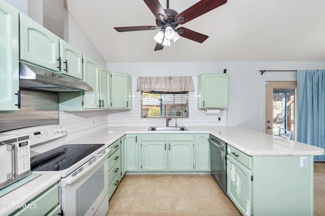 kitchen with sink, dishwasher, green cabinetry, white electric stove, and kitchen peninsula