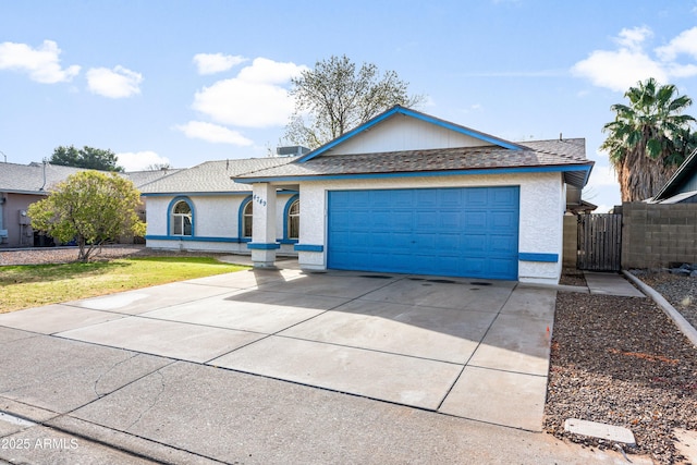 ranch-style home with a garage