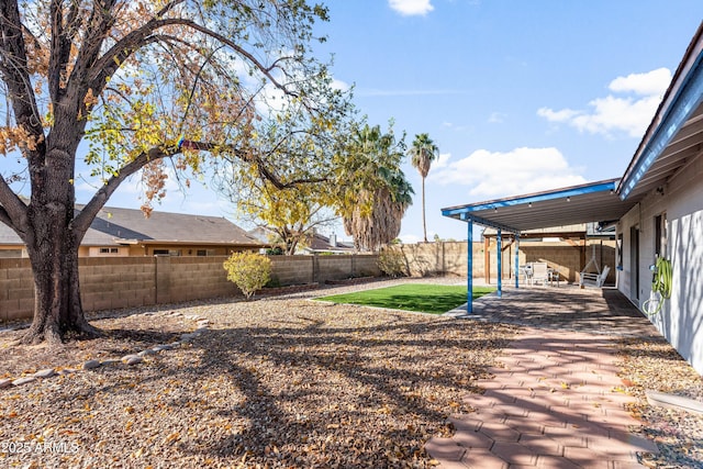 view of yard featuring a patio