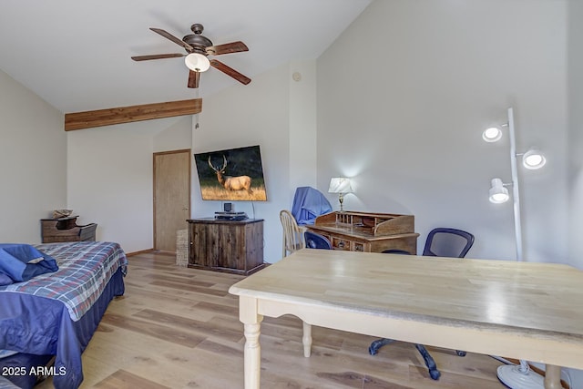 office space featuring ceiling fan, vaulted ceiling with beams, and wood finished floors