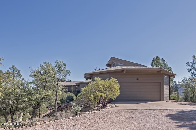 view of front facade featuring driveway and a garage