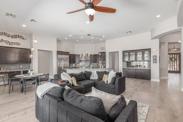 8725 E Menlo Cir, Mesa, AZ 85207 - living room with a ceiling fan, light wood-style floors, recessed lighting, and baseboards