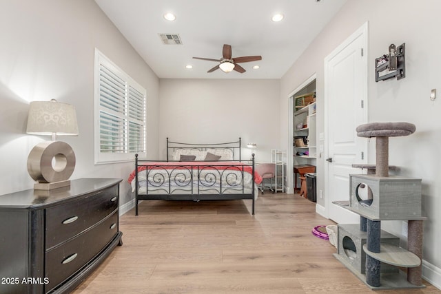 8725 E Menlo Cir, Mesa, AZ 85207 - bedroom featuring light wood-style flooring, recessed lighting, baseboards, and ceiling fan