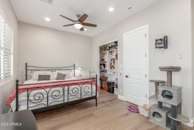 8725 E Menlo Cir, Mesa, AZ 85207 - bedroom featuring wood finished floors, recessed lighting, ceiling fan, and a closet