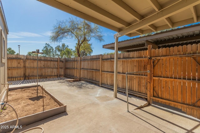 view of patio featuring a fenced backyard