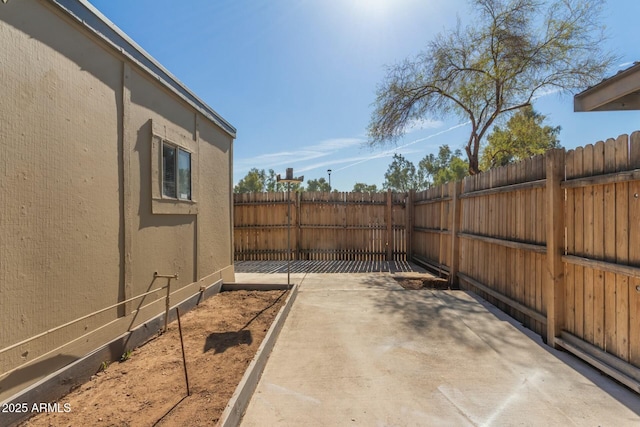 view of patio featuring a fenced backyard