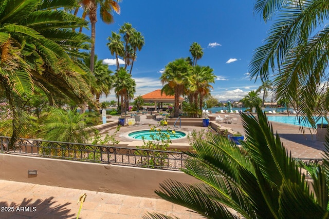 view of swimming pool with a patio area