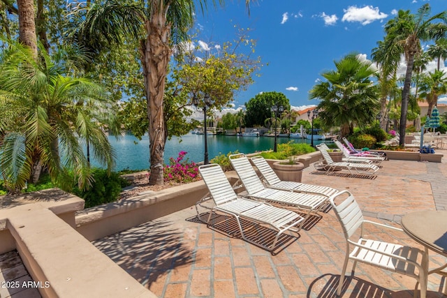 view of patio / terrace with a water view