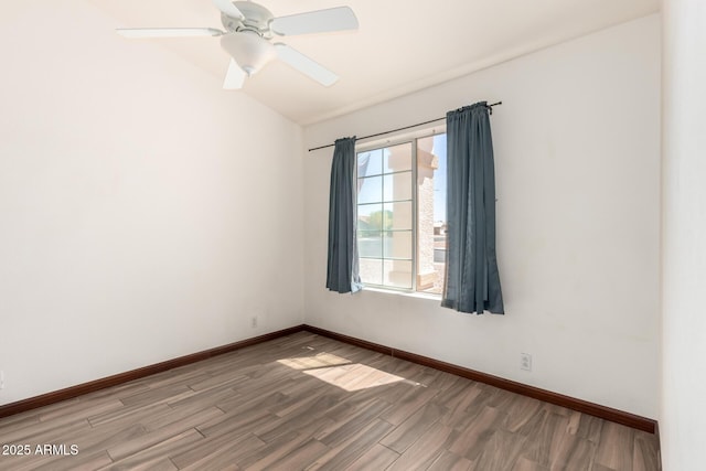 2356 N Glenview, Mesa, AZ 85213 - spare room with light wood finished floors, vaulted ceiling, and baseboards
