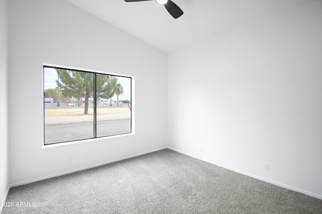 unfurnished room with lofted ceiling, carpet floors, and ceiling fan