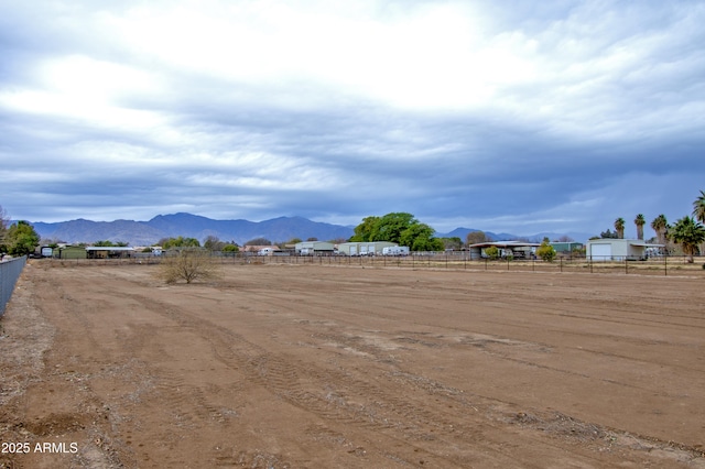 exterior space featuring a rural view and a mountain view