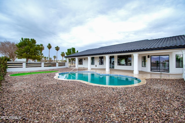 view of pool featuring a patio