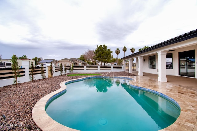 view of pool featuring a patio area