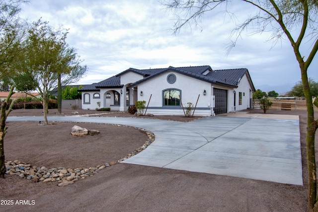 view of front of home with a garage