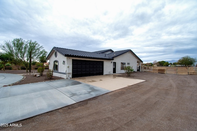 view of front of home with a garage