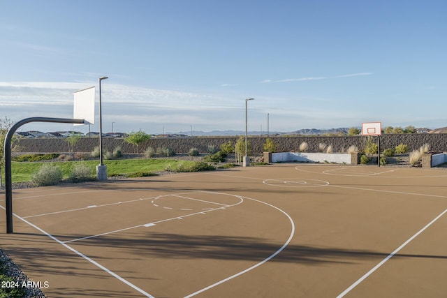 24066 N 162nd Ln, Surprise, AZ 85387 - view of sport court with community basketball court, a mountain view, and fence