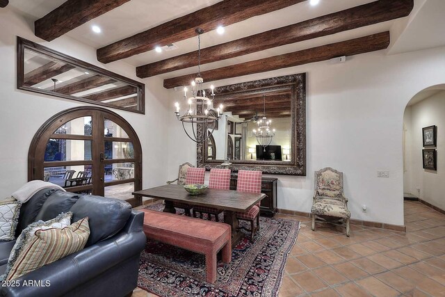2041 W Hemlock Way, Chandler, AZ 85248 - tiled dining area with arched walkways, a chandelier, beamed ceiling, baseboards, and french doors