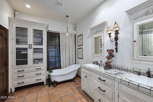 2041 W Hemlock Way, Chandler, AZ 85248 - full bathroom with a freestanding bath, double vanity, and tile patterned flooring