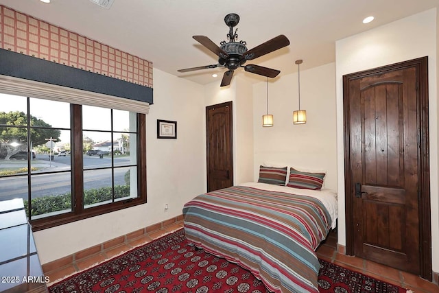 2041 W Hemlock Way, Chandler, AZ 85248 - bedroom featuring tile patterned floors, recessed lighting, and a ceiling fan