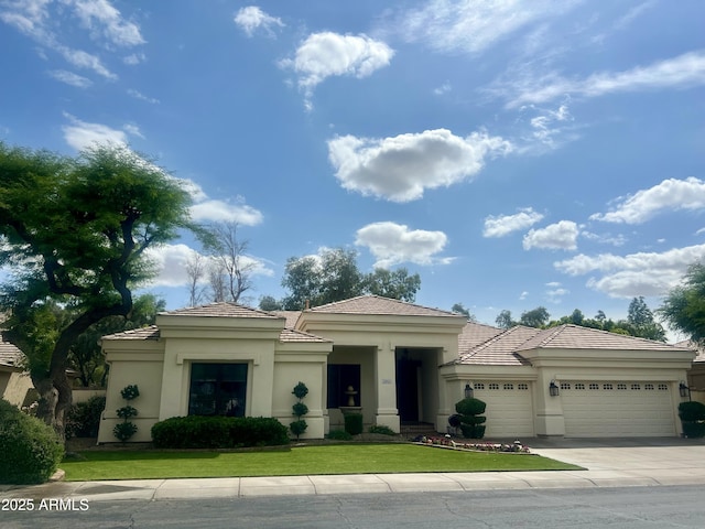 2041 W Hemlock Way, Chandler, AZ 85248 - prairie-style house with an attached garage, stucco siding, concrete driveway, and a tiled roof
