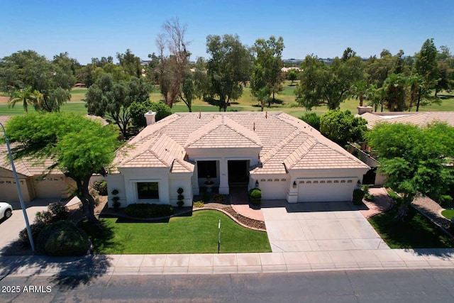 2041 W Hemlock Way, Chandler, AZ 85248 - view of front of property with a garage, stucco siding, a front lawn, driveway, and a tile roof