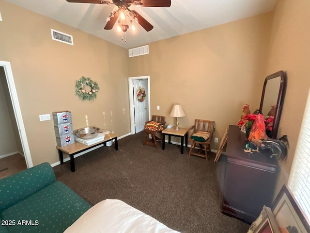 carpeted living room featuring ceiling fan